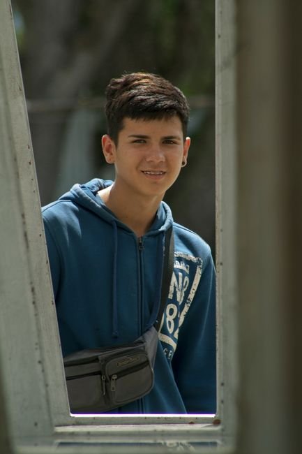 A smiling teenage boy
